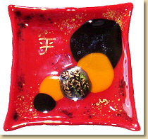 A beautiful red dish, and the Chinese word 'Peace'